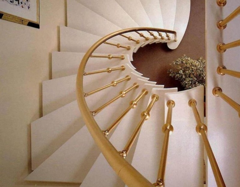 wooden spiral with golden rails