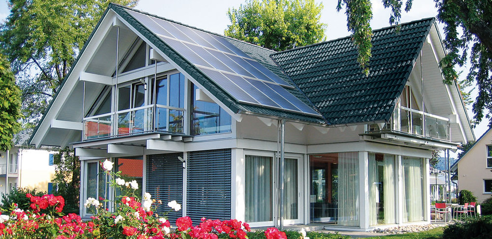 modern home with solar panels attached