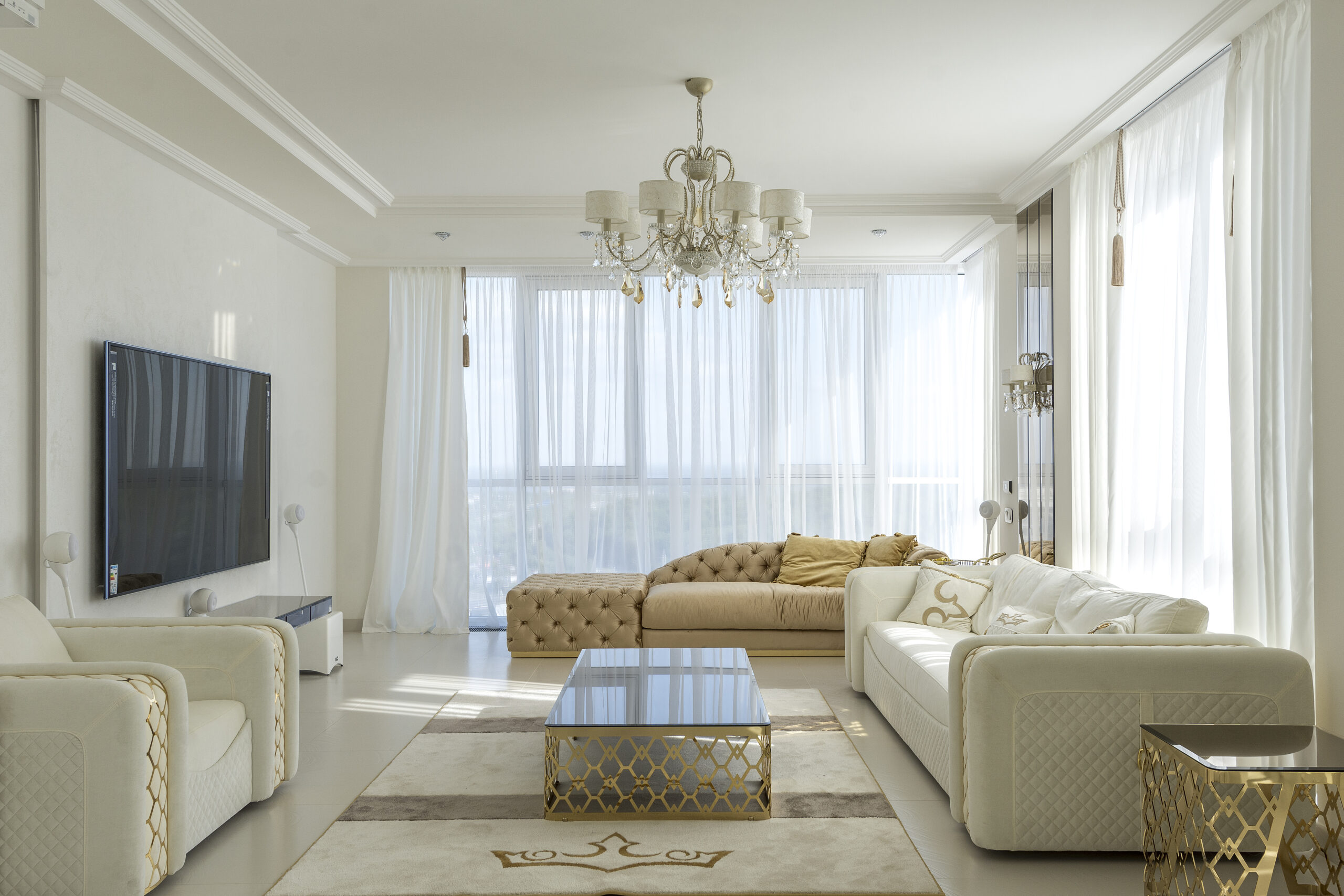 white living room with a touch of gold